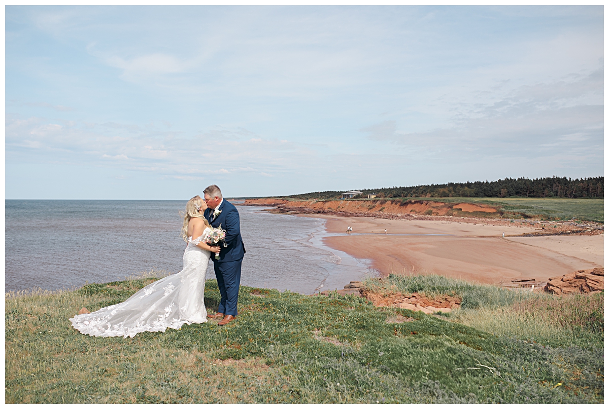 bride and groom posing at Cable Head